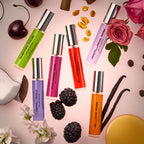 Collection of DON.BEAUTY perfume bottles with floral and fruit elements on a pink background