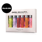 DON. BEAUTY fragrance discovery set with six small bottles in various colors on a white background.