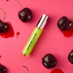 DON.BEAUTY Cherry Pulse surrounded by cherries on a pink background