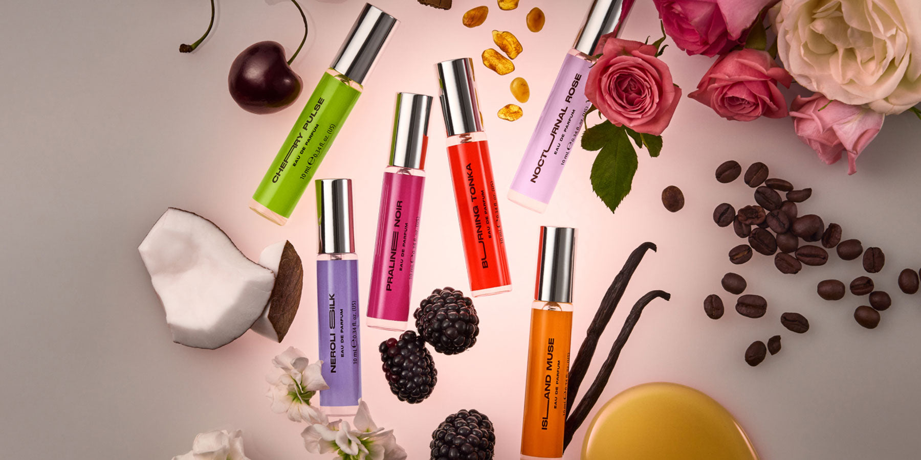 DON.BEAUTY Discovery Set EDP with flowers, fruits, and beans on a light background